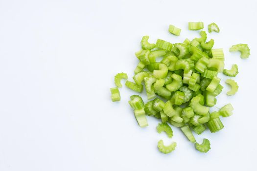 Fresh sliced celery on white background.
