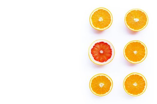High vitamin C, Juicy and sweet. Fresh orange and grapefruit on white background.