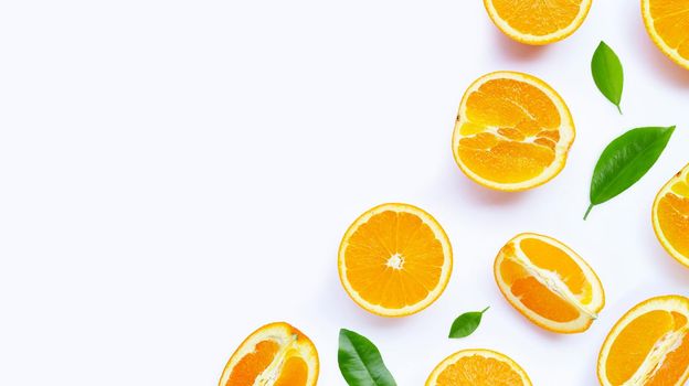 Oranges with leaves on white background. Copy space