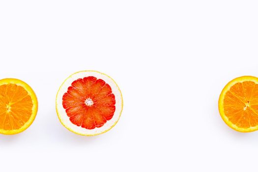High vitamin C, Juicy and sweet. Fresh orange and grapefruit on white background. Copy space
