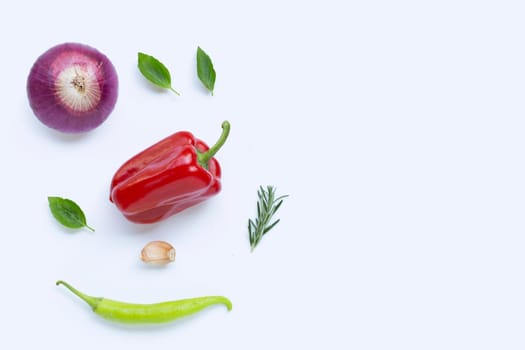 Various fresh vegetables and herbs on white background. Healthy eating concept