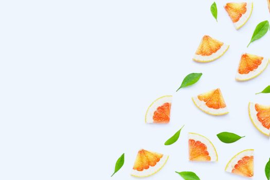 High vitamin C. Juicy grapefruit slices on white background.