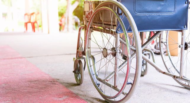 Closeuo empty wheelchairs in the hospital parked waiting for physical patient services, medical care concept