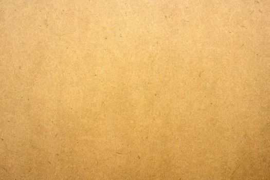 Brown paper or cardboard texture for background.