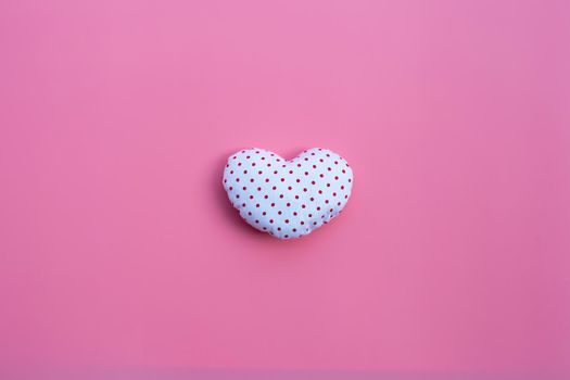 Valentine's heart on pink background. Copy space