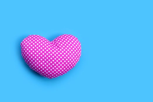Valentine's heart on blue background. Copy space