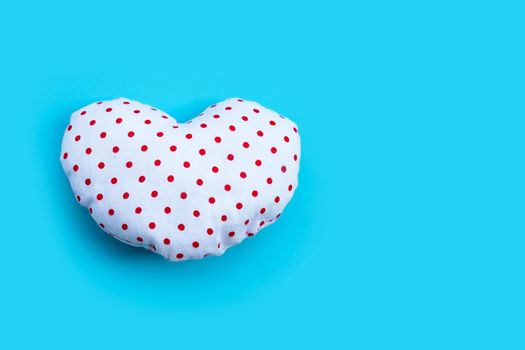Valentine's heart on blue background. Copy space