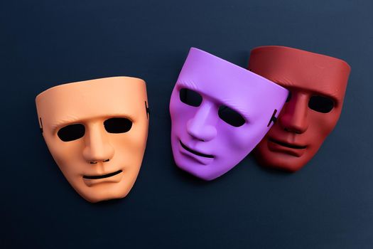 Face masks on dark background. Top view