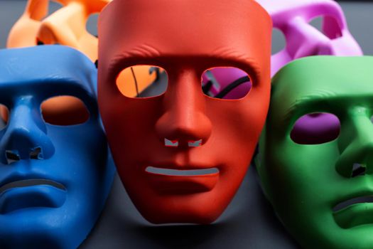 Face masks on dark background.