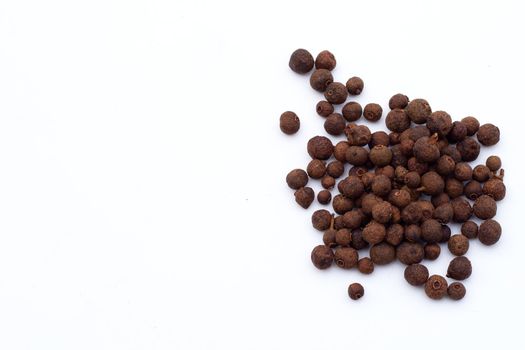 Allspice on white background. Copy space