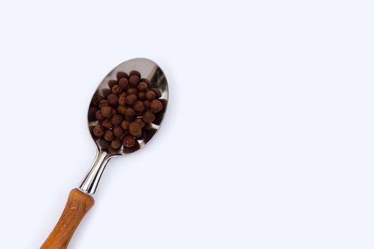 Allspice on white background. Copy space