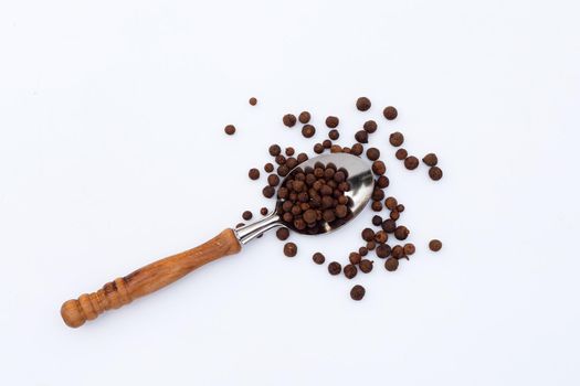 Allspice on white background. Copy space