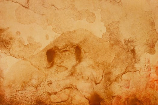Old brown paper grunge background. Abstract liquid coffee color texture.