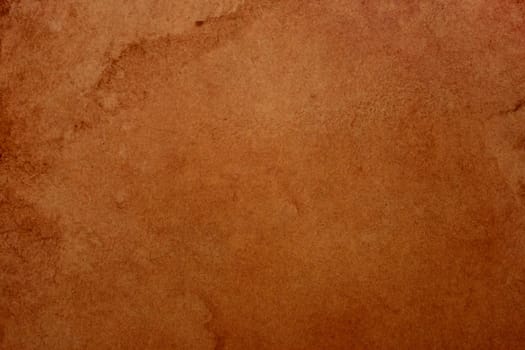 Old brown paper grunge background. Abstract liquid coffee color texture.