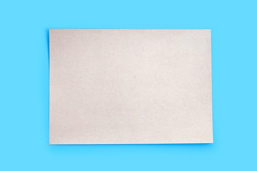 Brown paper texture on blue background.