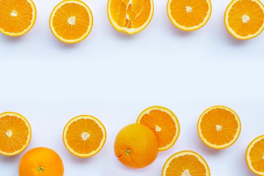 High vitamin C, Juicy and sweet. Frame made of fresh orange fruit on white background.