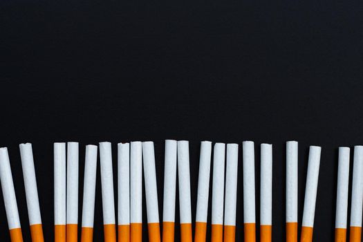 Cigarette on dark background. Non smoking for health concept