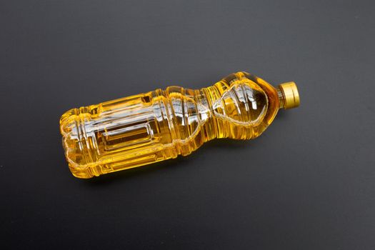 Rice bran oil on dark background.