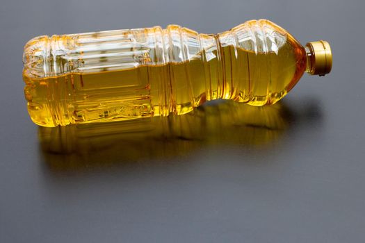 Rice bran oil on dark background.