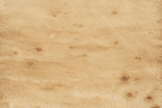 Old brown paper grunge background. Abstract liquid coffee color texture.