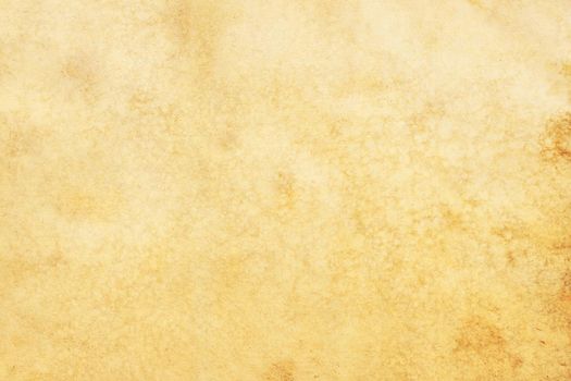 Old brown yellow paper grunge background. Abstract liquid coffee color texture.