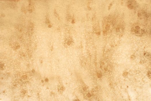 Old brown paper grunge background. Abstract liquid coffee color texture.