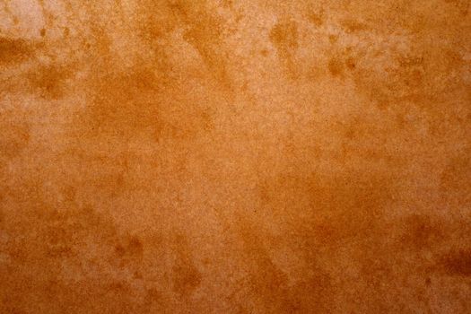 Old brown paper grunge background. Abstract liquid coffee color texture.
