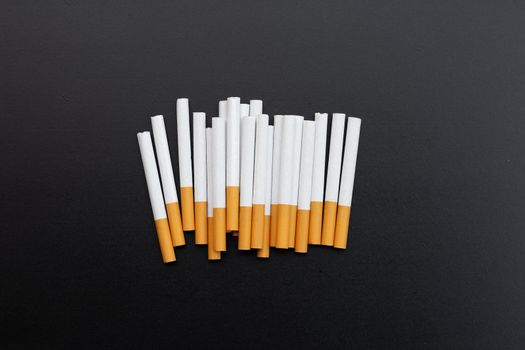 Cigarette on dark background. Non smoking for health concept