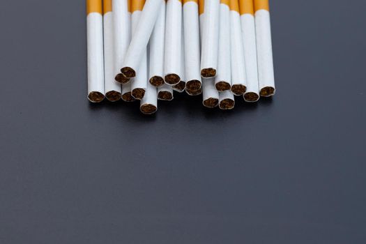 Cigarette on dark background. Non smoking for health concept