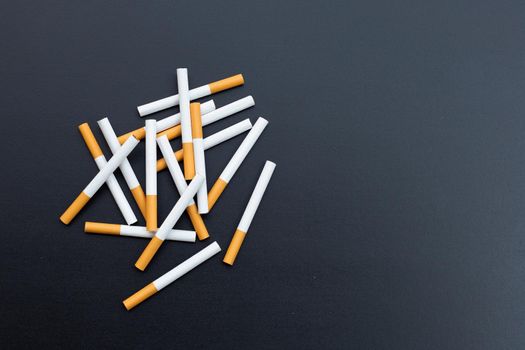 Cigarette on dark background. Non smoking for health concept