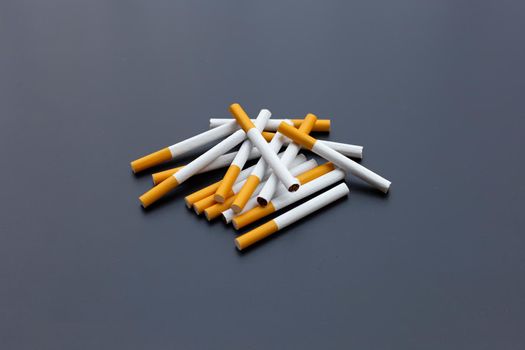 Cigarette on dark background. Non smoking for health concept