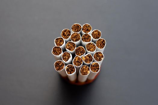 Cigarette on dark background. Non smoking for health concept