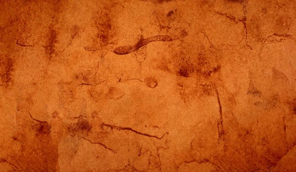 Old brown paper grunge background. Abstract liquid coffee color texture.