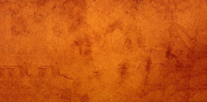 Old brown paper grunge background. Abstract liquid coffee color texture.