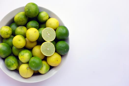 Frsh limes isolated on white background.