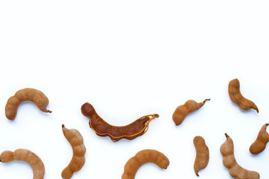 Tamarind tropical fruit on white background. Top view
