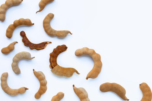 Tamarind tropical fruit on white background. Top view