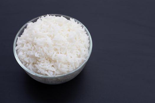 Dish of rice on white background.