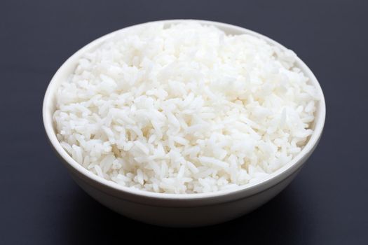 Dish of rice on white background.