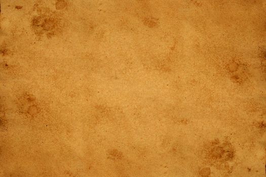 Old brown paper grunge background. Abstract liquid coffee color texture.