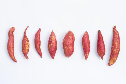 Sweet potato on white background. Top view