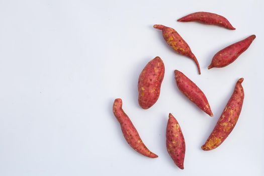 Sweet potato on white background. Top view