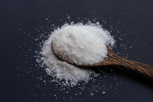 Salt on dark background. copy space