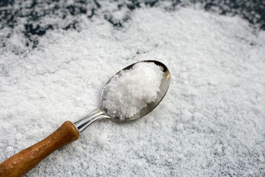 Salt on dark background. copy space