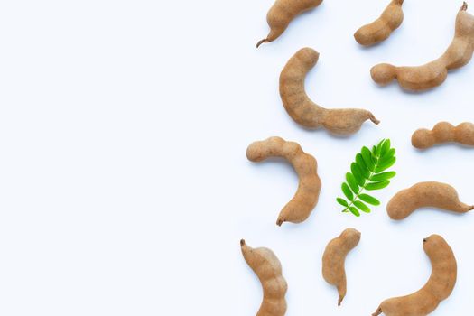 Tamarind tropical fruit on white background. Top view
