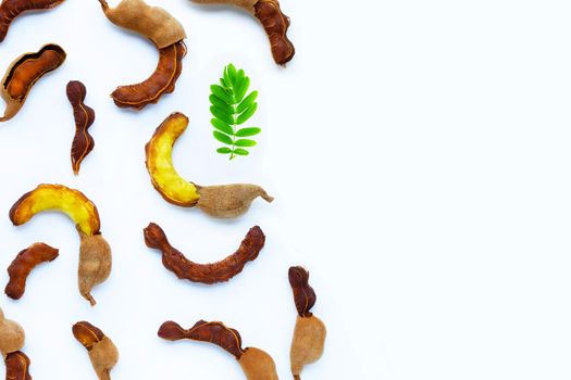 Tamarind tropical fruit on white background. Top view