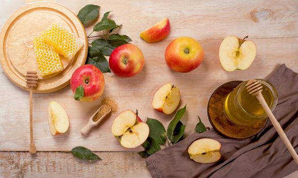 Jewish holiday Rosh Hashana background with apples, honey on blackboard. View from above. Flat lay