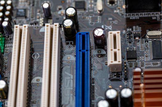 detail of a motherboard with connectors and heatsinks of a fixed computer