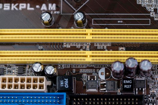 detail of a motherboard with connectors and heatsinks of a fixed computer