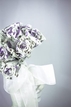 Bridal bouquet made with paper. Blue and beige color. No people